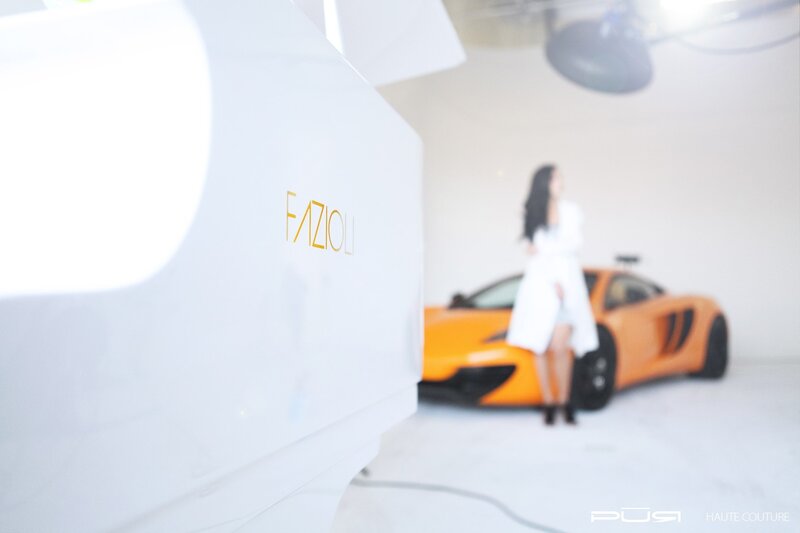 woman in white dress with orange car