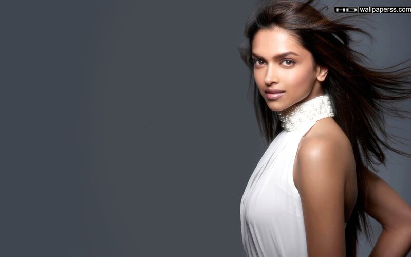 woman in white dress with pearls