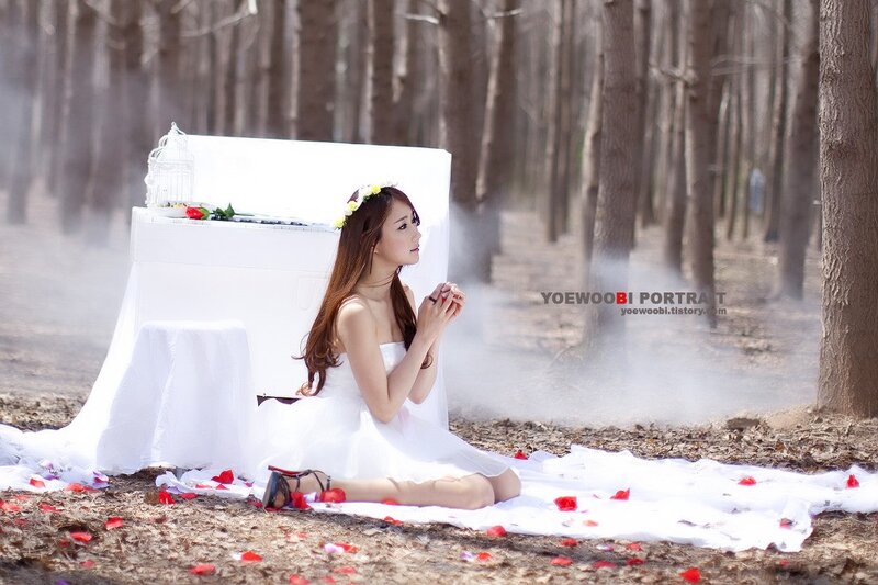 woman in white dress with piano