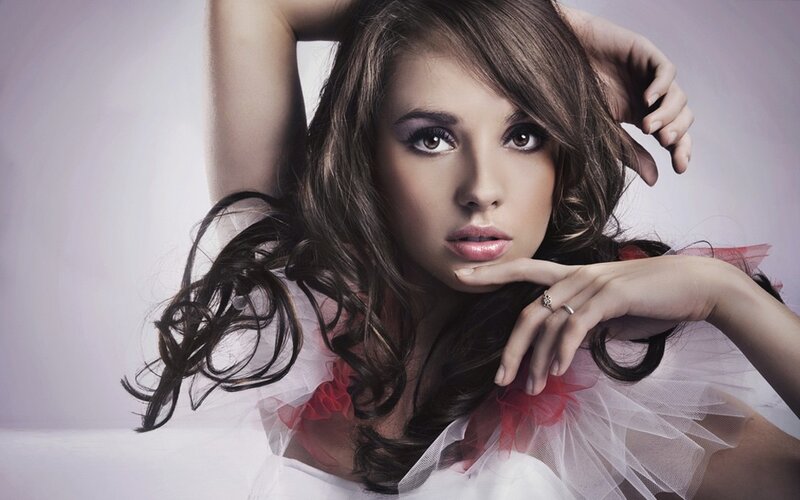 woman in white dress with red accents
