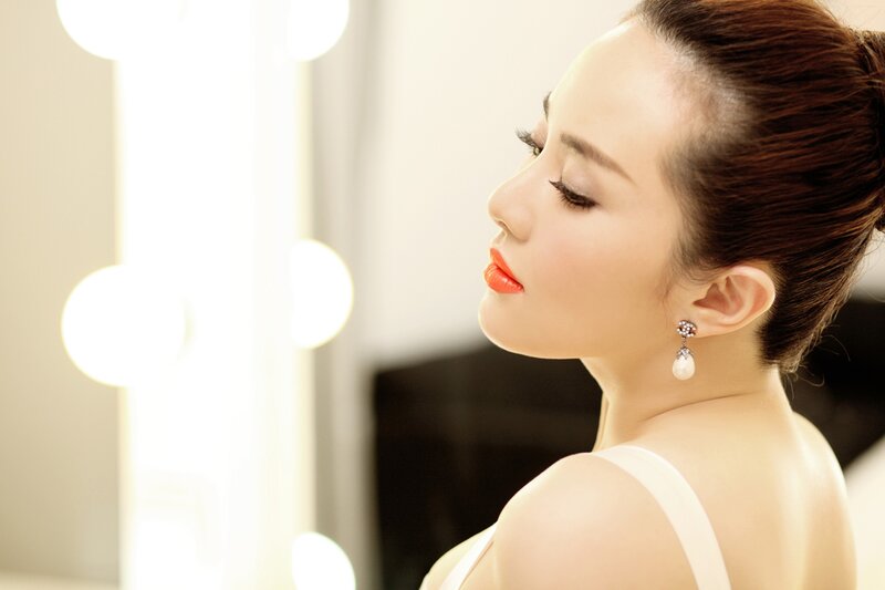 woman in white dress with red lipstick