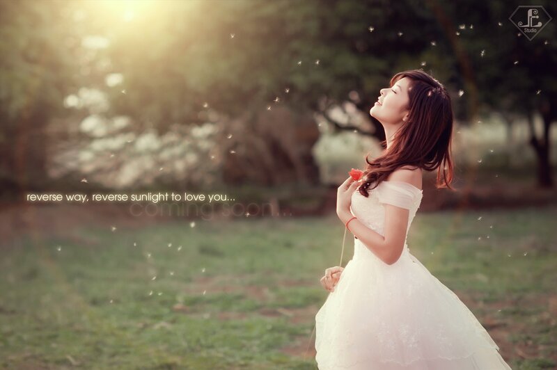 Woman in white dress with rose