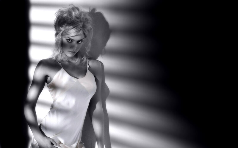 woman in white dress with shadows