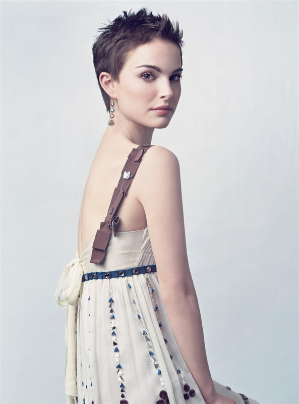 woman in white dress with short hair