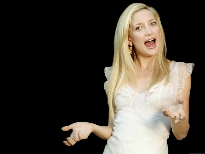 woman in white dress with surprised expression