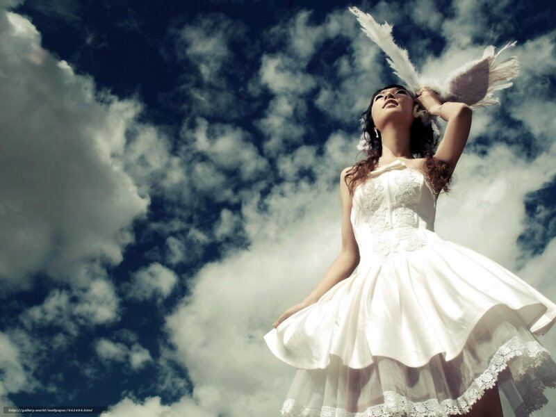 woman in white dress with wings
