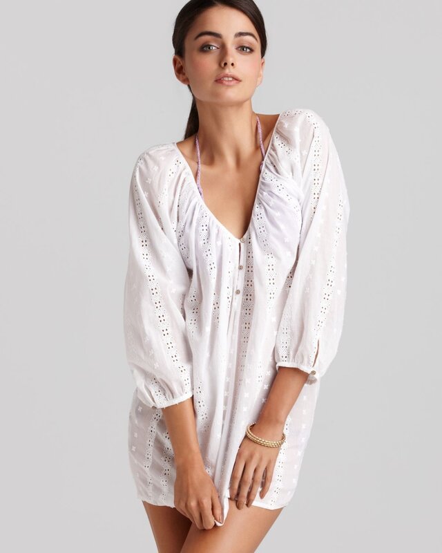 woman in white eyelet dress