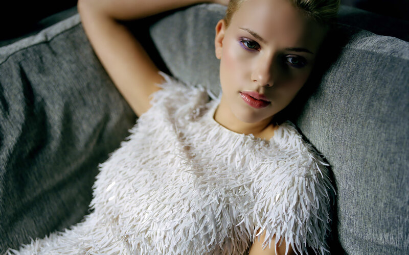 woman in white feather dress