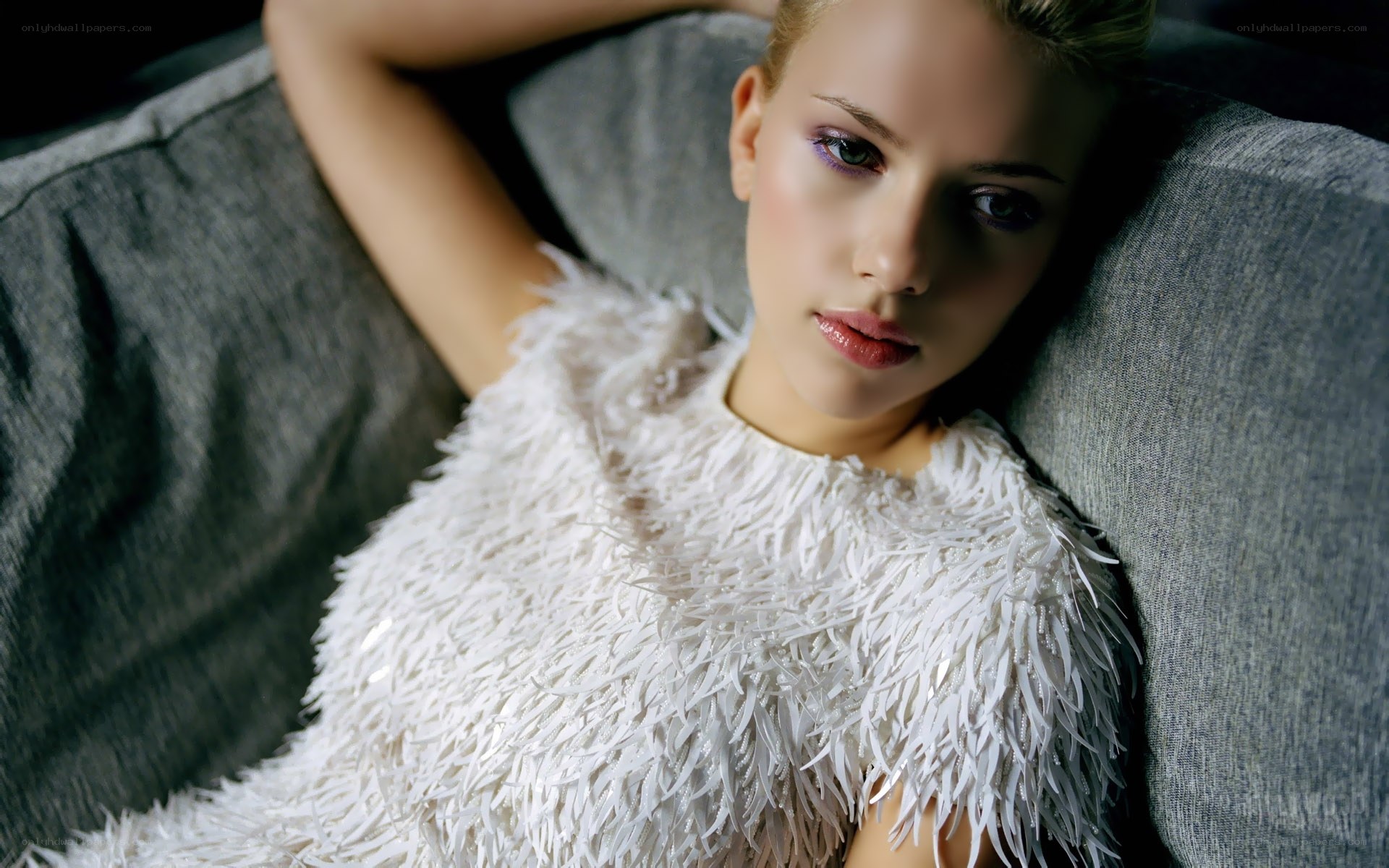 woman in white feather dress