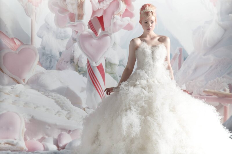 woman in white feather gown