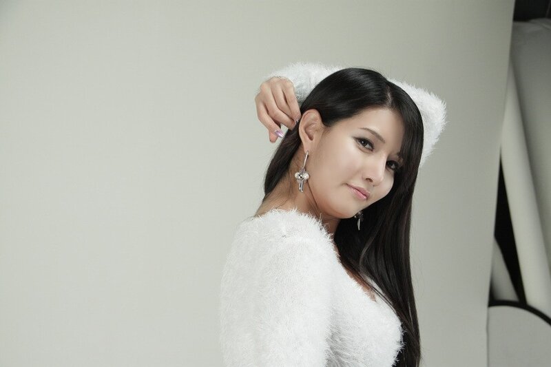 woman in white fluffy sweater