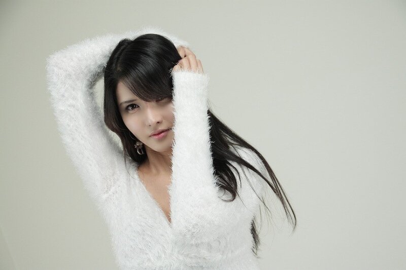 woman in white fluffy sweater
