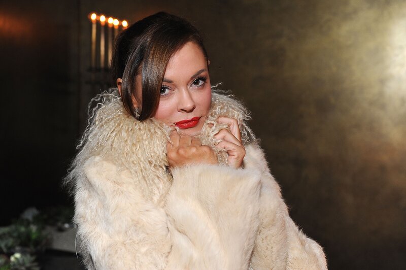 woman in white fur coat