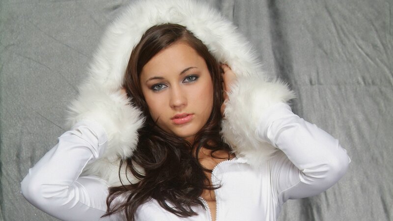 woman in white fur coat