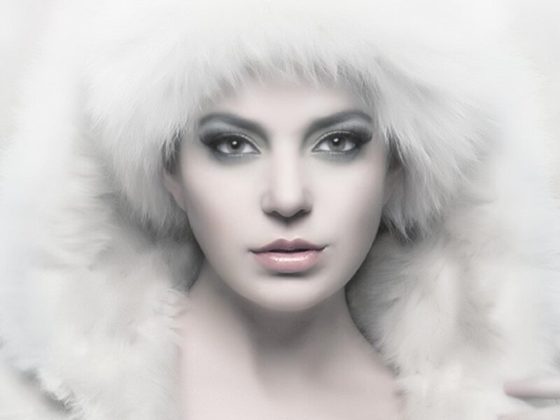 woman in white fur coat