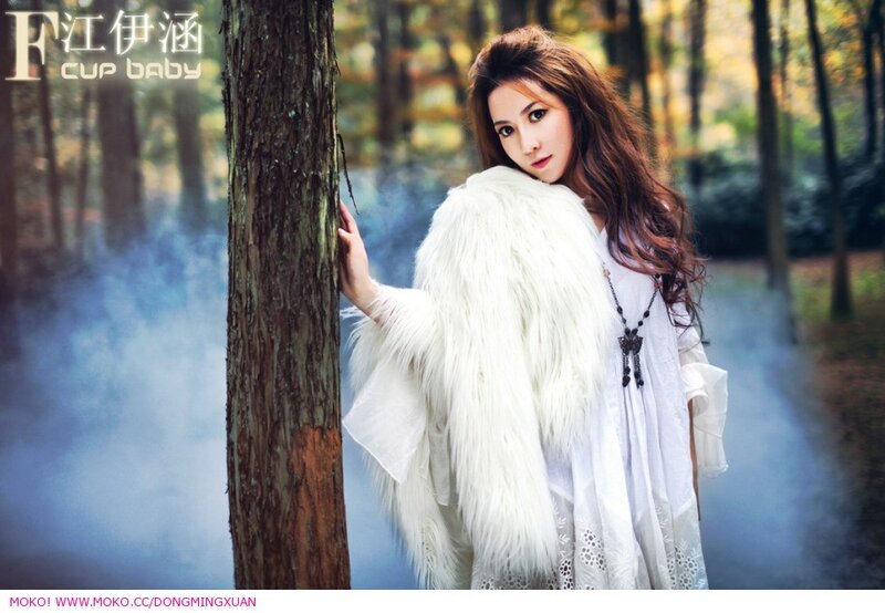 woman in white fur coat
