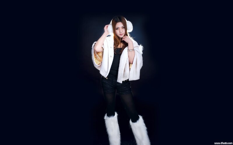 woman in white fur coat