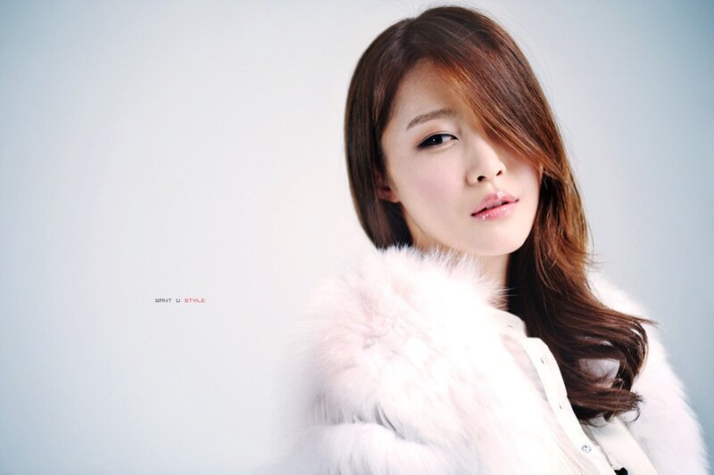woman in white fur coat