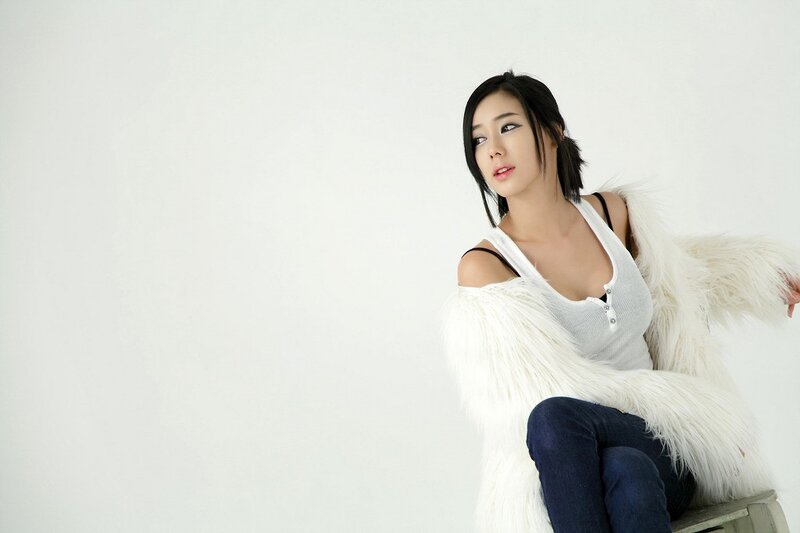 woman in white fur coat