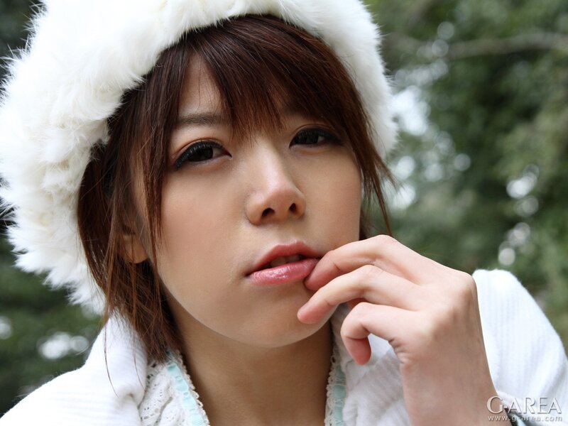 woman in white fur hat