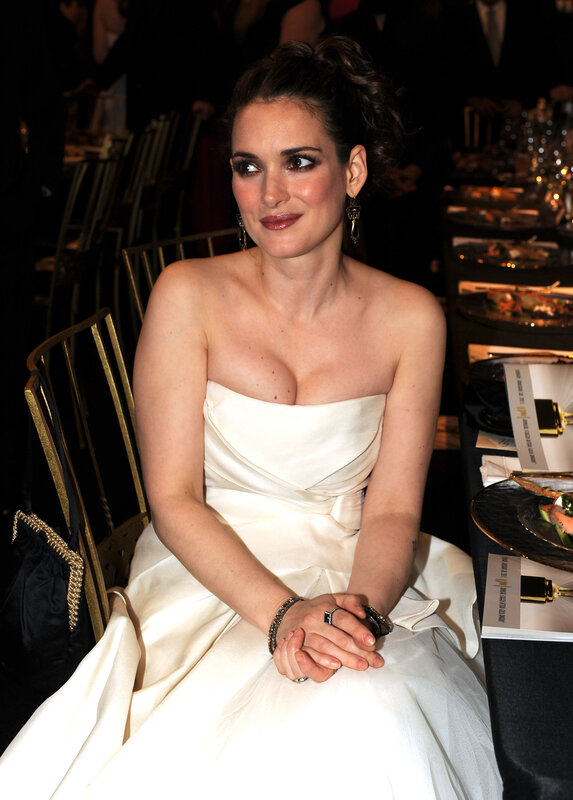 Woman in white gown at event