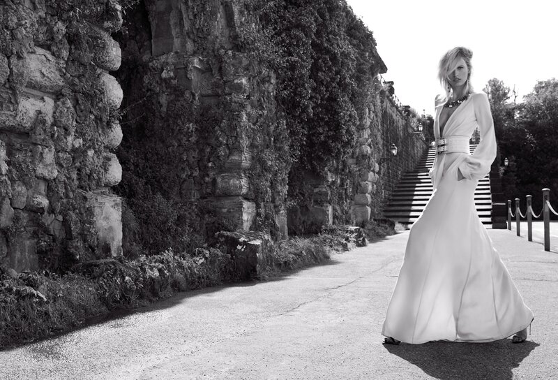 woman in white gown on stone path