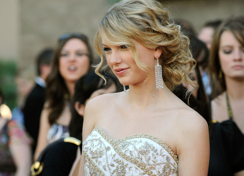 woman in white gown smiling