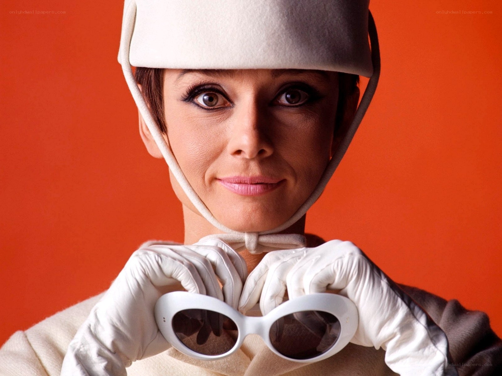 woman in white hat and gloves