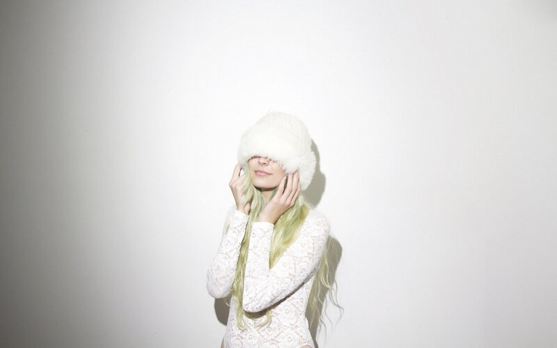 woman in white hat and lace