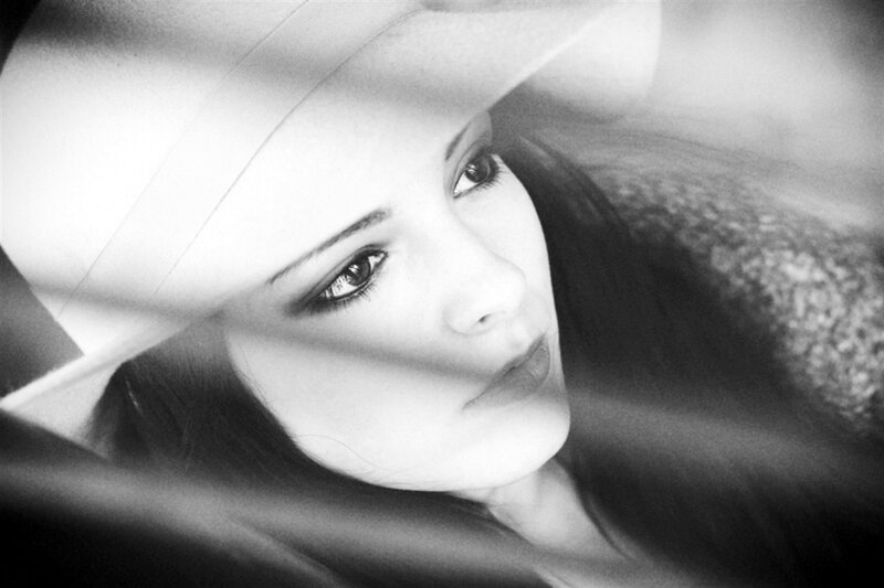 Woman in White Hat — Black, Dramatic, Photograph, Eyes