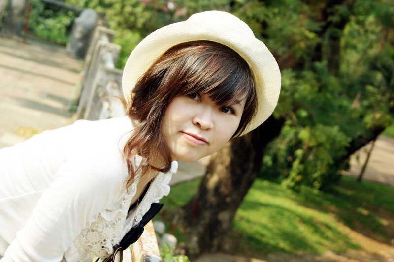 woman in white hat outdoors