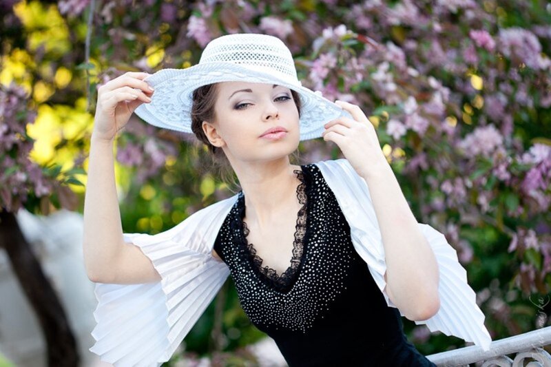Woman in White Hat — Serene, Spring