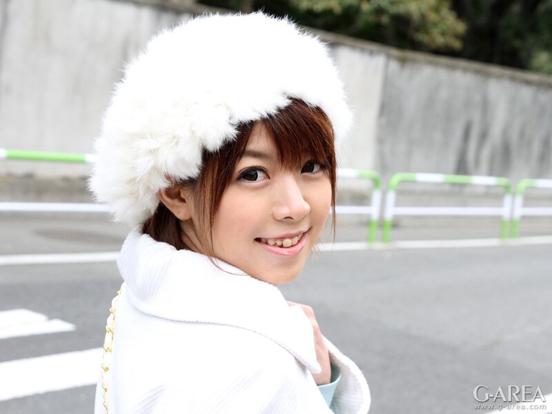 woman in white hat smiling