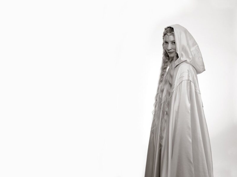 woman in white hooded cloak