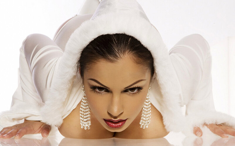 Woman in White Hooded Outfit — Dramatic