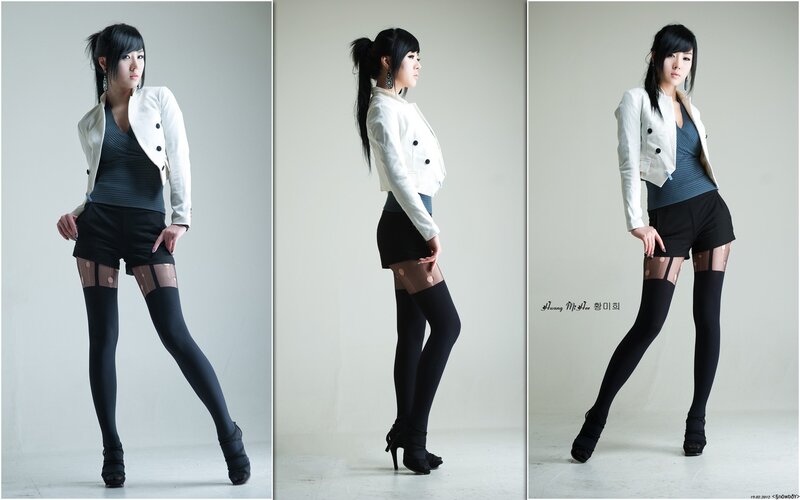 woman in white jacket and black tights