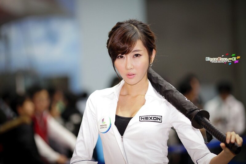 Woman in white jacket at event