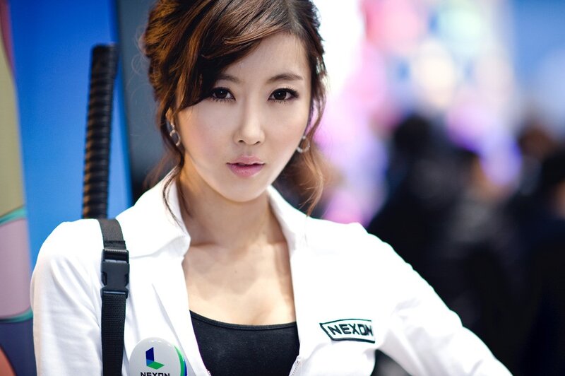 woman in white jacket at event