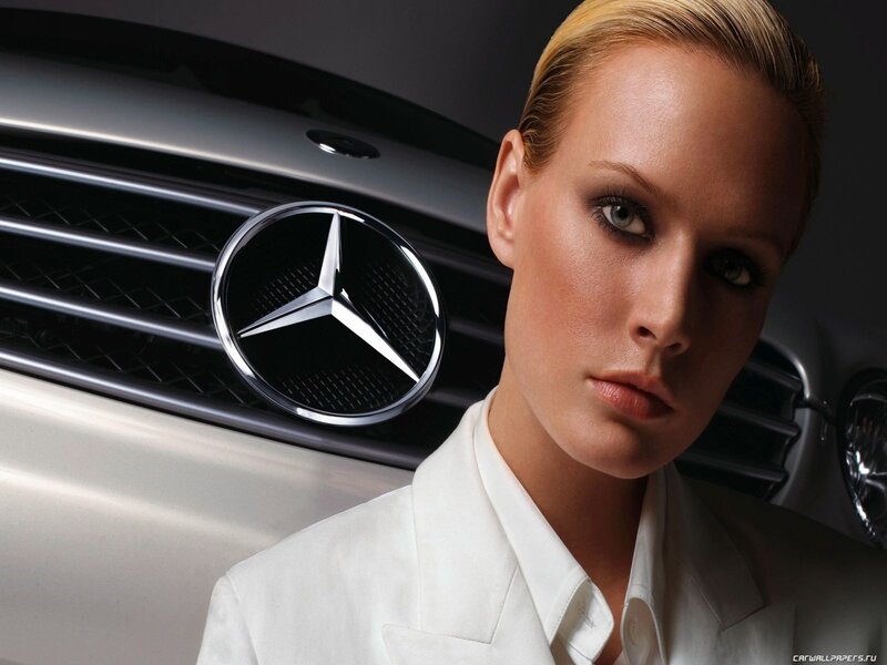 Woman in White Jacket — Dramatic, Photograph, Car Grille