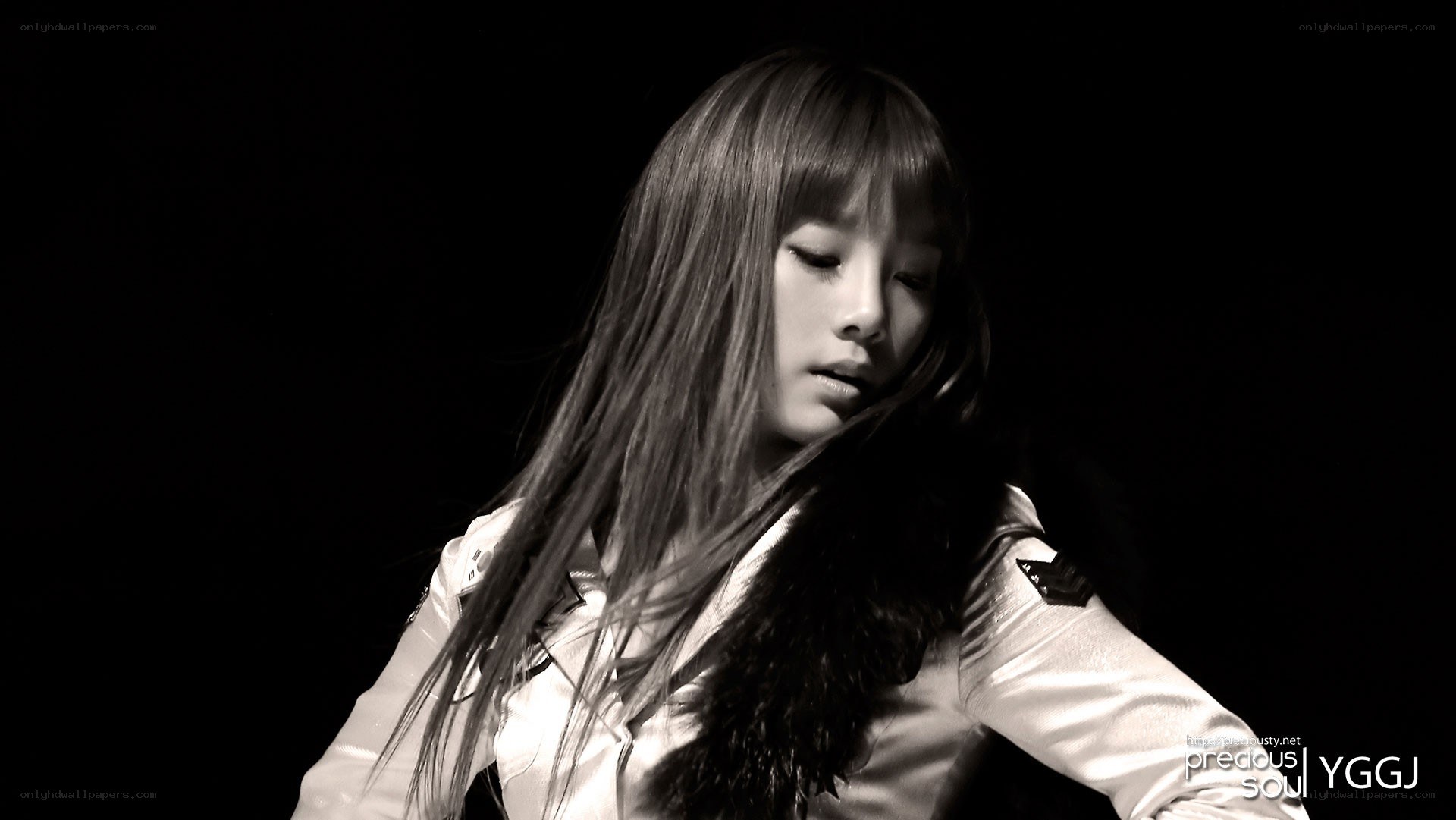 woman in white jacket on stage