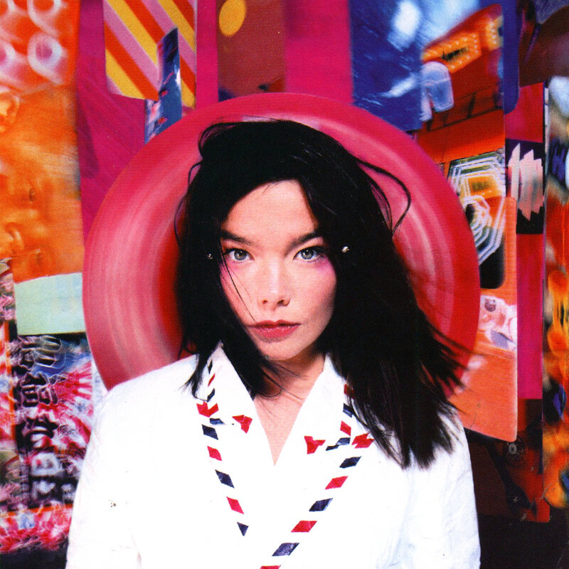 woman in white jacket with colorful background