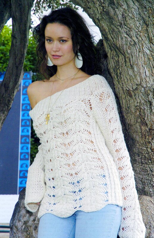 Woman in white knit sweater