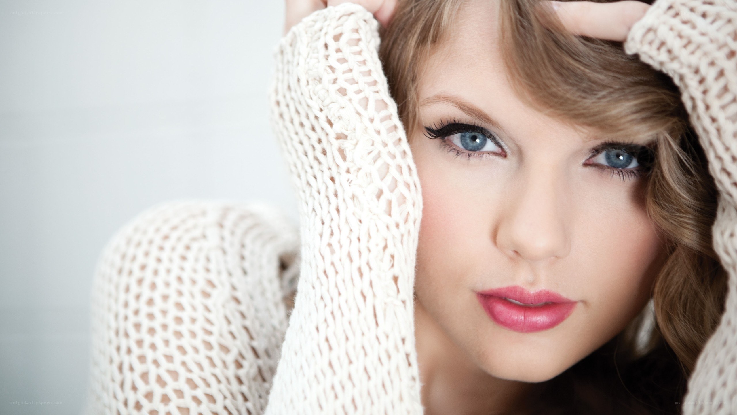 woman in white knit sweater
