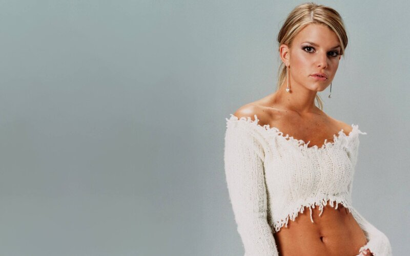 woman in white knit top