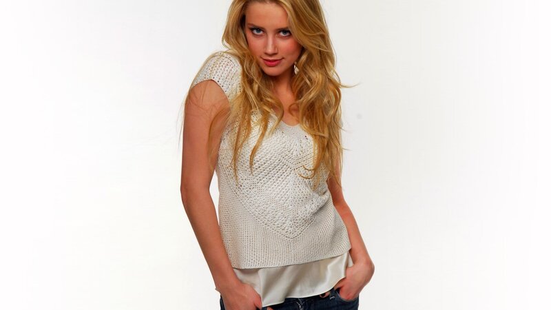 woman in white knit top