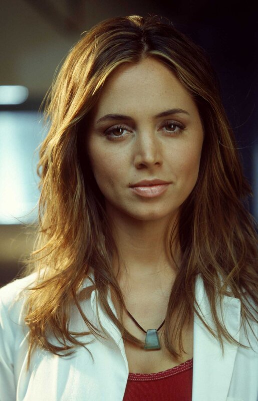 woman in white lab coat