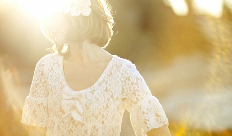 woman in white lace dress