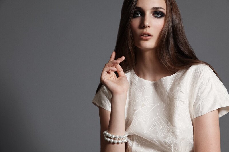 woman in white lace dress