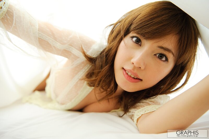 woman in white lace lying down