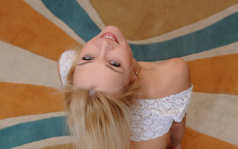 woman in white lace top